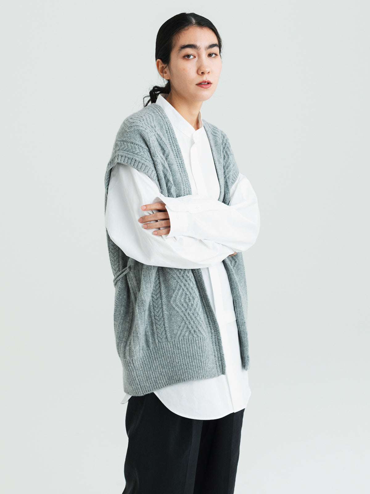 Cable Vest<br> The three-dimensional cable pattern is distinctive.