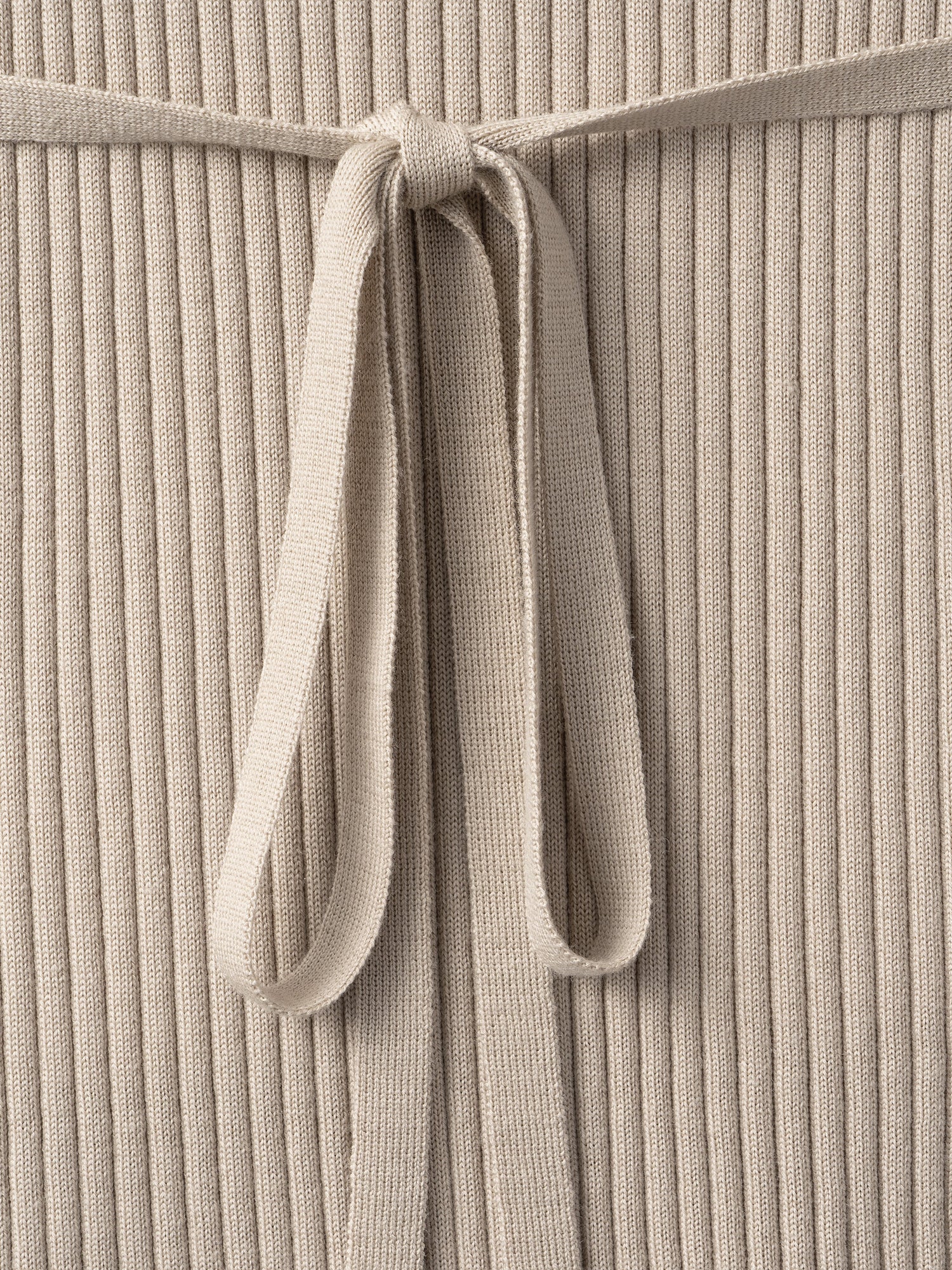 Wrap Pullover<BR>共地の紐で着方のアレンジが可能