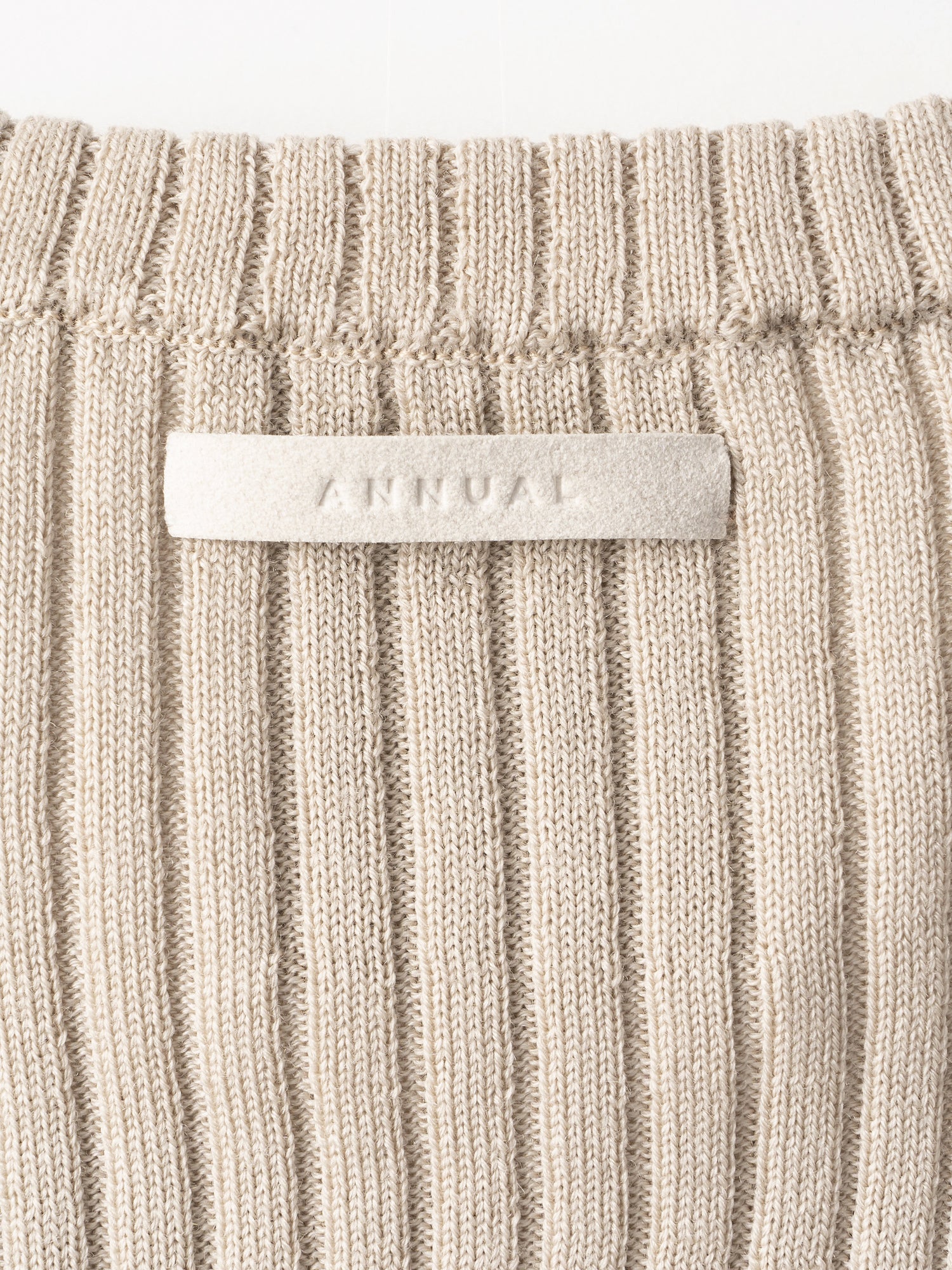 Wrap Pullover<BR>共地の紐で着方のアレンジが可能