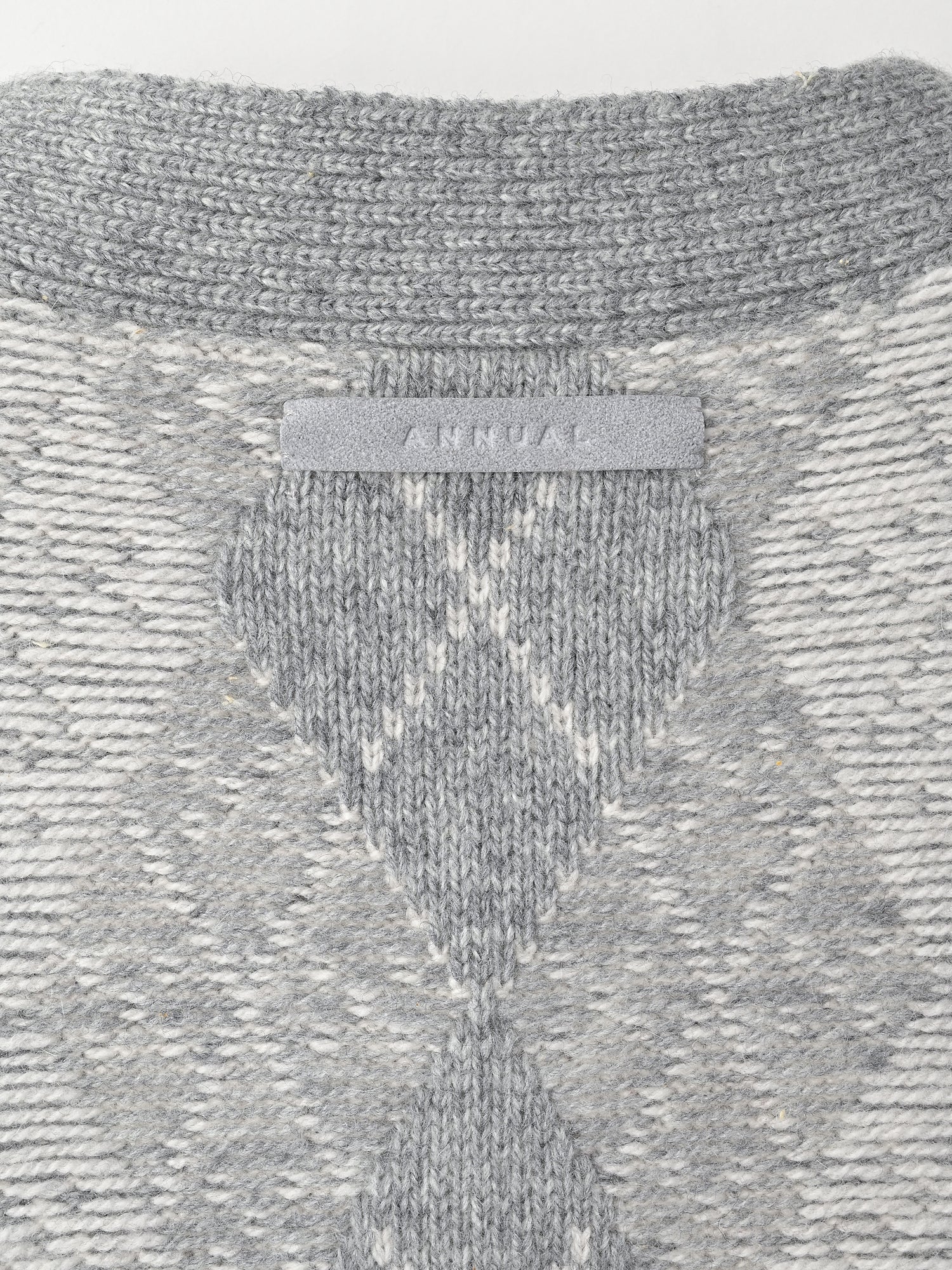 Argyle cardigan<BR>ユニセックスで着られるカーディガン