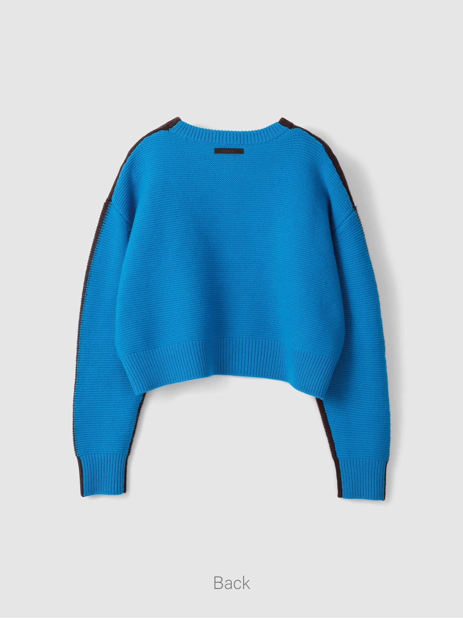 Bi-Color Crew PO<br> Cropped knitwear is a big hit every year