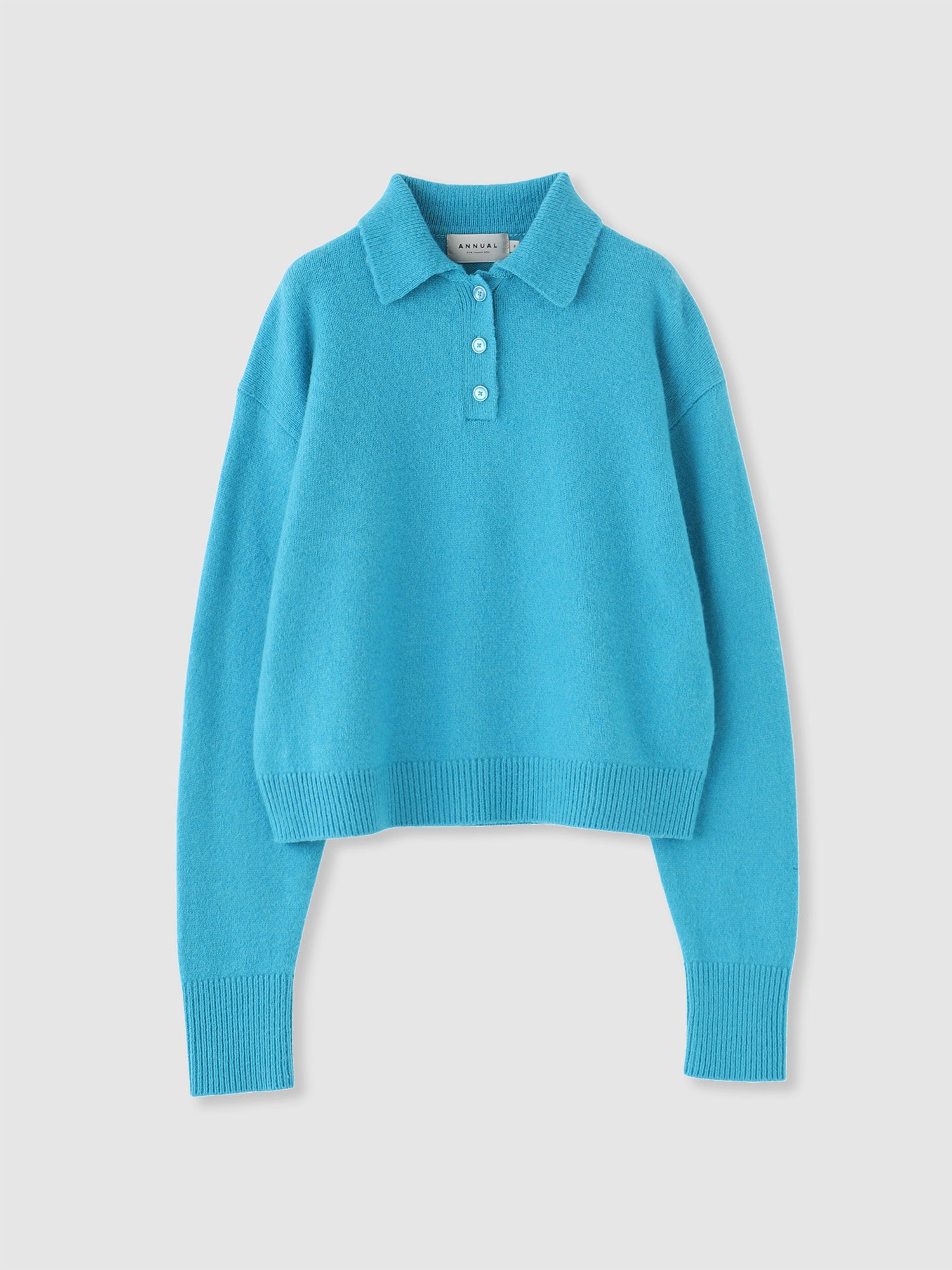 Brushed Polo Sweater, 起毛加工による柔らかな着心地