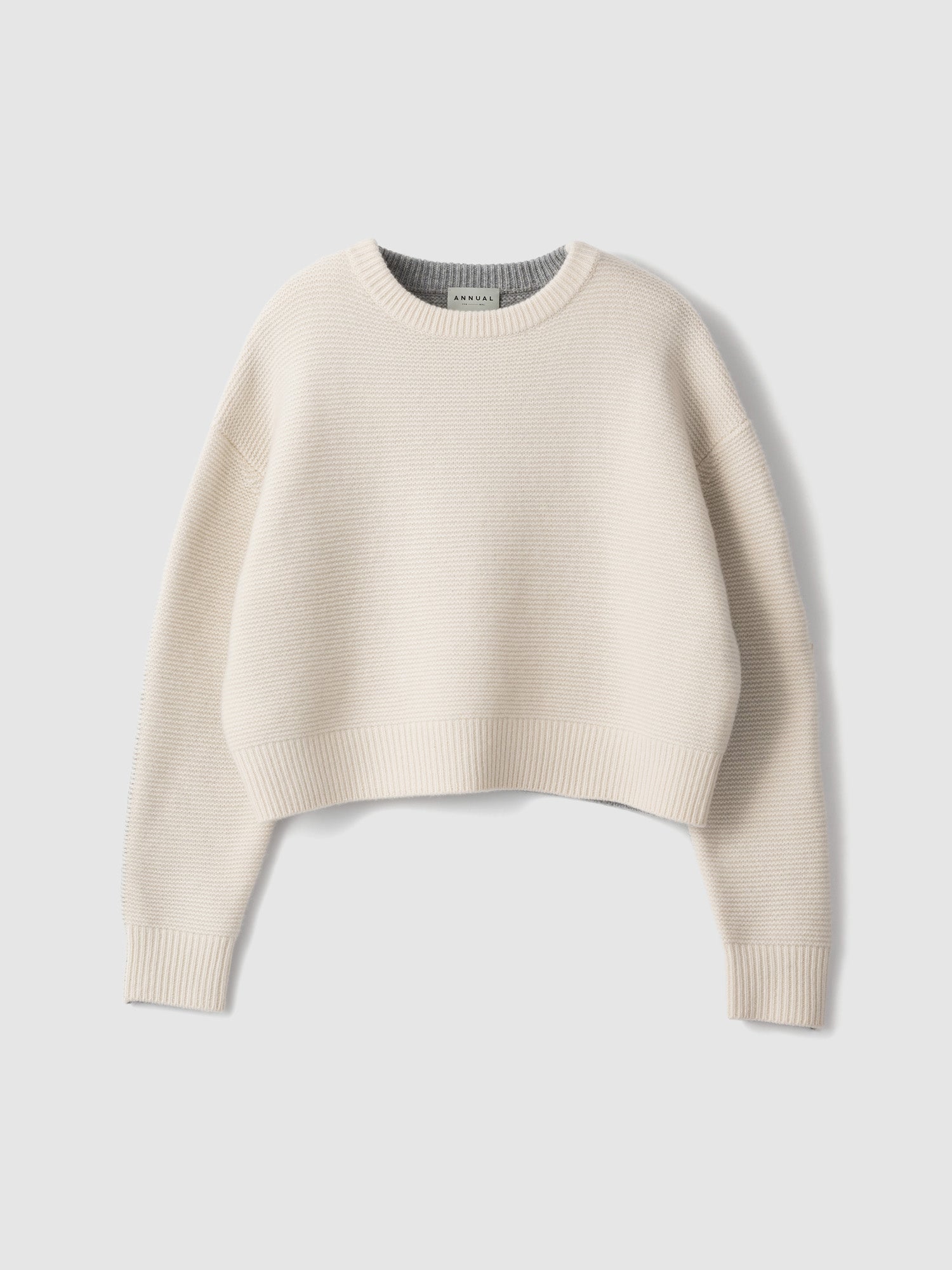 Bi-Color Crew PO<br> Cropped knitwear is a big hit every year